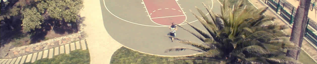 2 people dancing on a basketball court